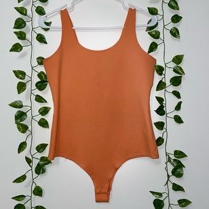 Orange bodysuit